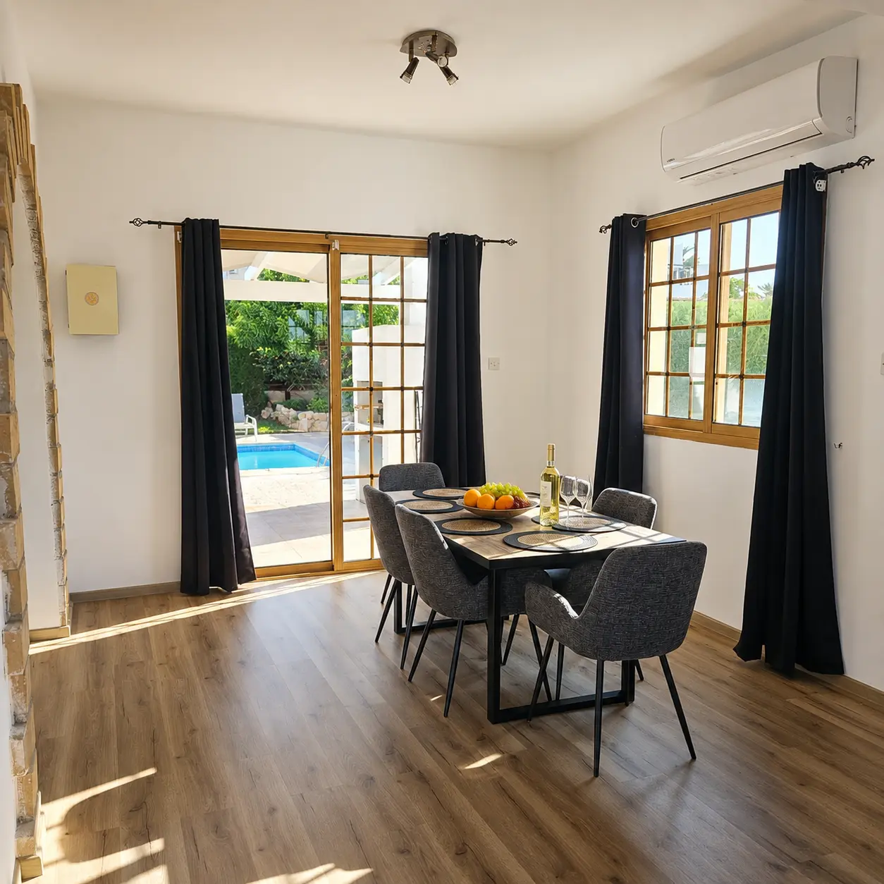 Indoor dining beside the pool terrace